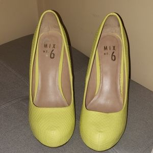 Neon yellow pumps